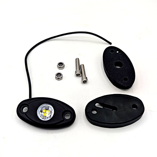 A black oval LED light kit with a wire, two mounting pieces, and two silver screws on a white background.