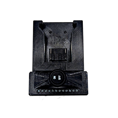 A black 3D-printed electronic device, likely a custom battery charger or adapter, featuring a central power button labeled '5V 4.5A' and multiple connection ports, shown on a plain white background.