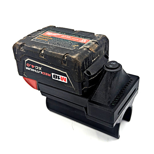 Black and red Milwaukee M18 tool battery on a white background