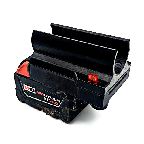 A black M18 red lithium XC-4.0 cordless battery pack with its top cover open, showing a small red indicator light and a black label with white and red text, on a white background.